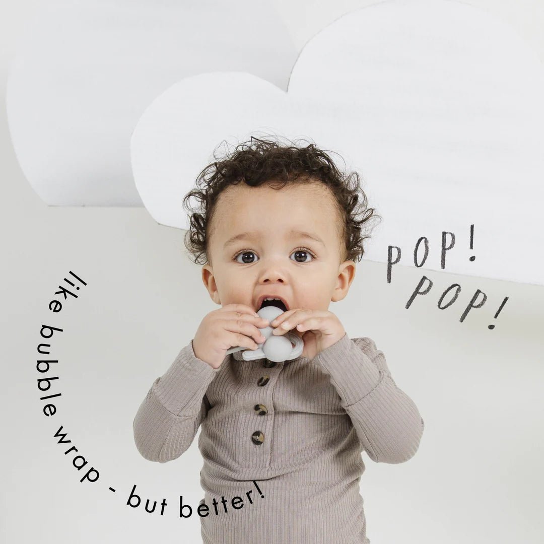 Doddle & Co. The Chew Poppable Teether in Looks Like Rain Hip Mommies