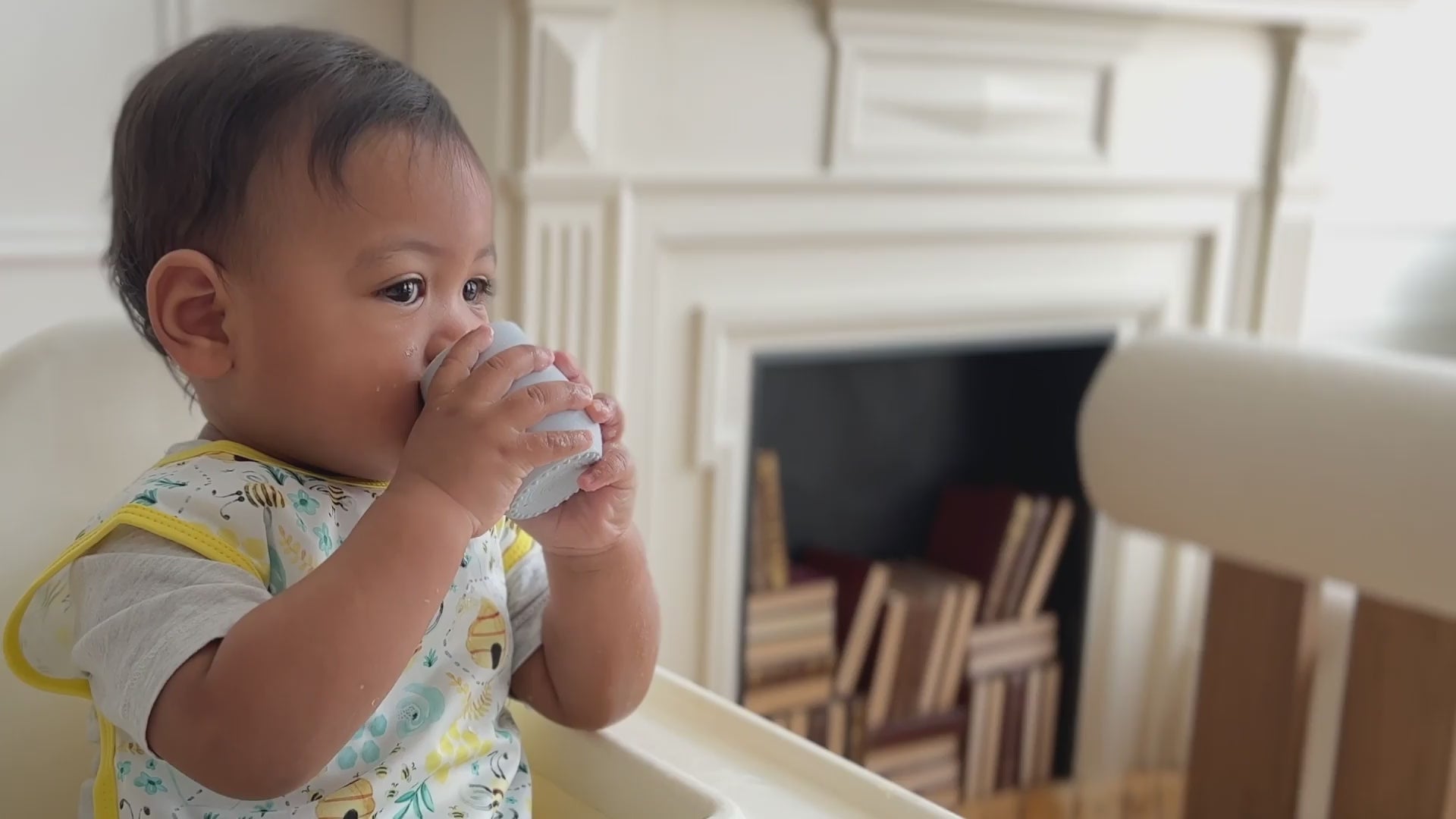 Load video: How the ezpz Tiny Cup Helps Your Baby Reach Mealtime Milestones